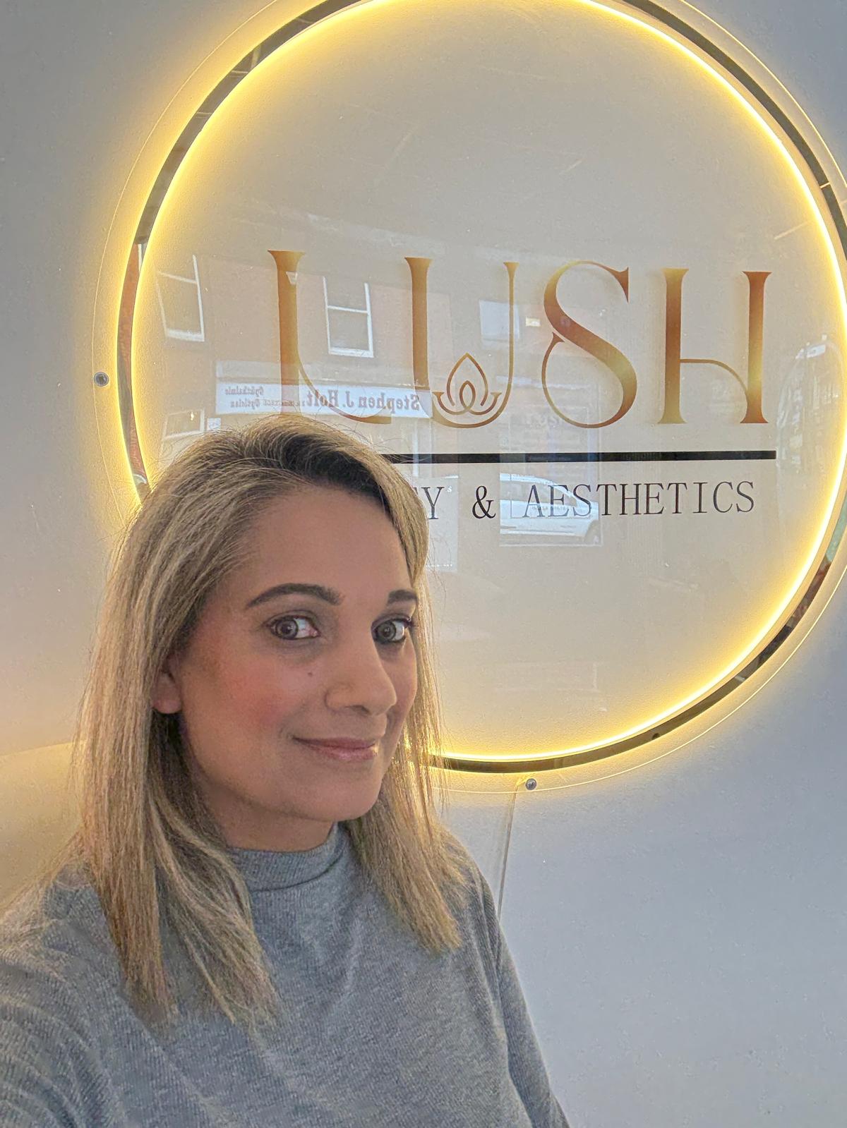 Photo of Soniah in front of Lush Beauty logo